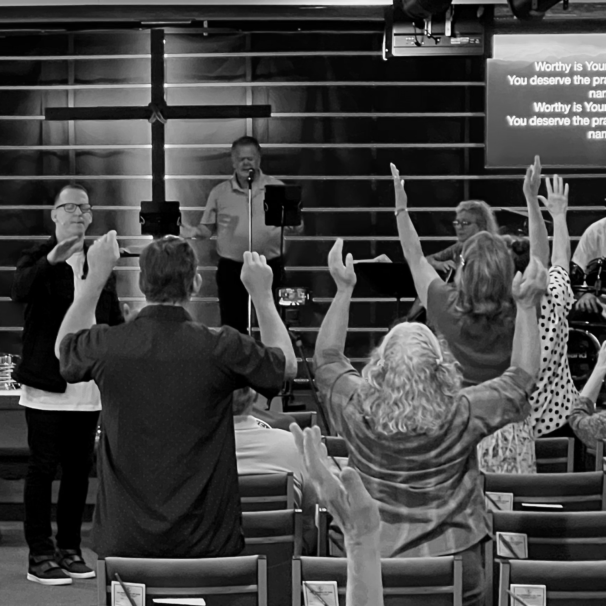 People worshipping during a Sunday Service at FACR